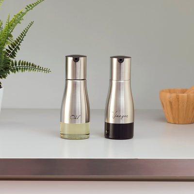 2 of 3:Home Basics 8.5 oz. Oil and Vinegar Set with See-Through Glass Base, Silver 