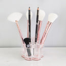 5 of 5:Organizador de cosméticos redondo de plástico con fondo de rosa Home Basics 