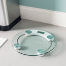 4 of 7:Báscula de baño de vidrio digital redonda Home Basics, 13X1.25 pulgadas 
